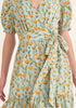 Paisie Floral Midi Wrap Dress with Peplum Hem in Green Close Up